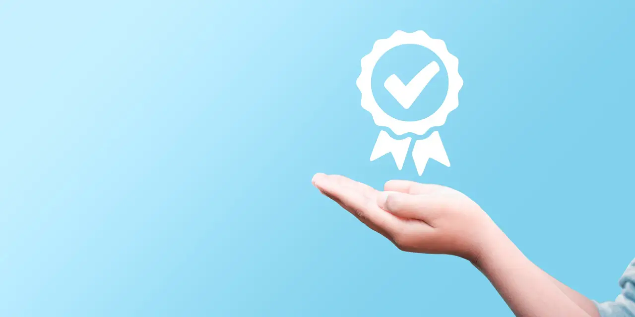 hand giving a warranty checkmark